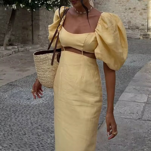Vestido largo dos piezas de mangas abullonadas