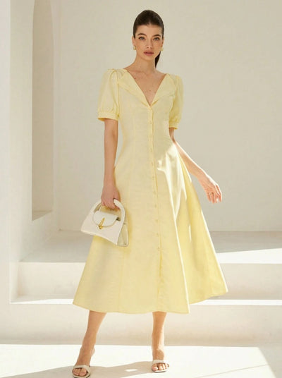 Vestido largo de rayas con escote en V y mangas abullonadas